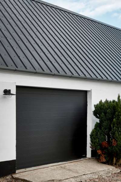 Bindingsværksgård ”tækket” med stålprofiler, Sneserevej 69, 4733 Tappernøje